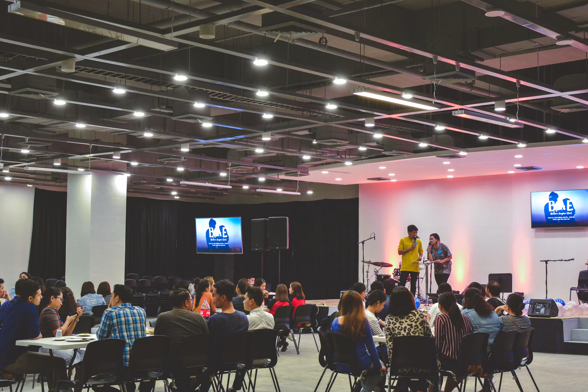 Colleagues collaborating at a corporate event